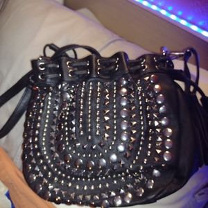 Off the shoulder fringe purse